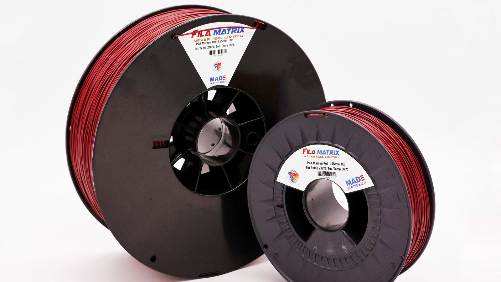 Large and small black spools of Filamatrix PLA maroon red 3D printer filament